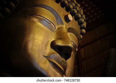 A Mercy Face From The Big Buddha, Daibutsu Of Nara, Japan