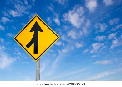 Merge road sign as symbol of cooperation. Merging Sign, Road, Diamond Shaped, Directional Sign. Business decisions concept with traffic sign - Shutterstock ID 2029501079
