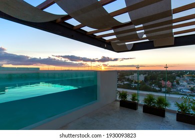 Merida, Mexico 11 February, 2020: A swimming pool at the roof of the upscale hotel in Merida with scenic views over Merida cityscape and Paseo Montejo.