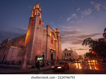 Merida, Mexico -February 23, 2016: Merida Cathedral (San Ildefonso), with stark Renaissance architecture, illuminated at night in the main square Plaza Grande, Merida, Yucatan, Mexico.