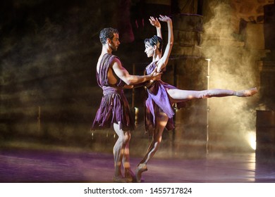 Merida, Spain - July 18, 2019: 65th Edition Of The International Festival Of Classical Theatre In Merida. Play “Antigone” By Ballet Company Of Victor Ullate. Pair Of Ballet Dancers