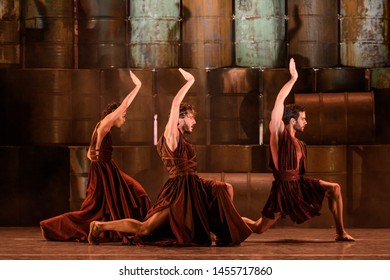 Merida, Spain - July 18, 2019: 65th Edition Of The International Festival Of Classical Theatre In Merida. Play “Antigone” By Ballet Company Of Victor Ullate. Trio Of Dancers