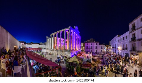 Merida, Spain - June 07, 2019 Emerita Ludica, Representation History In Merida, Spain.Panorama Of The Temple Of Diana With Public