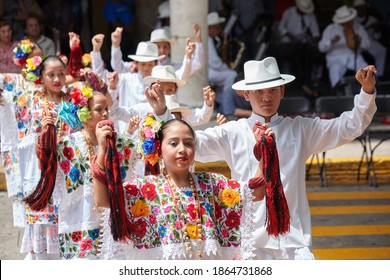 Merida, Yucatan, Mexico-October 2011: Young dancers performing jarana (traditional dance) at city festival