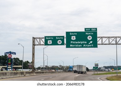 Meridian, MS - Oct. 24, 2021: Signs At Exit 150 On I-20 For Philadelphia, Mississippi, And Meridian Airport Via Routes 11 And 19.