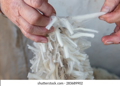 Merino Wool In Hands Of An Old Woman