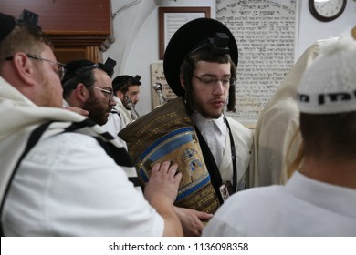 MERON, ISRAEL - AUG 1, 2017: Unidentified Orthodox Jewish Man Holds A Torah Scroll On The Jewish Holiday Of Tisha Bav In Meron, Israel