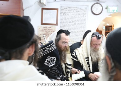 MERON, ISRAEL - AUG 1, 2017: Unidentified Orthodox Jewish Man Holds A Torah Scroll On The Jewish Holiday Of Tisha Bav In Meron, Israel