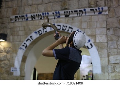 Meron, Israel, September 17 2017 - A Jewish Child Blows A Shofar At The Rashbi Gravesite In Meron