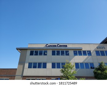 Merriam, Kansas / USA - August 20 2020: Sign For CANCER CENTER At Advent Health Shawnee Mission Medical Center Beneath Blue Sky