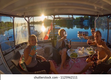Merrickville Ontario Canada , June 23 2018 - Sunset dinner while boating on the Rideau river