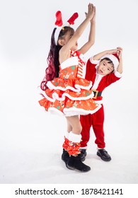 Merry Christmas Girl Wearing Santa Claus Suit Dancing Baby Shark On White Background