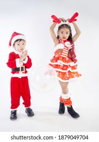 Merry Christmas Girl Wearing Santa Claus Suit Dancing Baby Shark On White Background