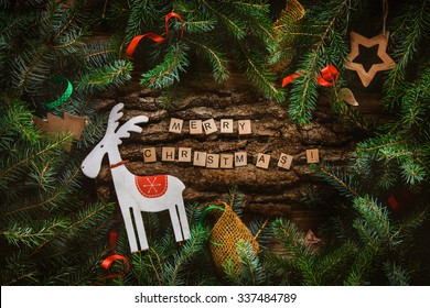 Merry Christmas. Christmas Greeting Card With Rustic Wood And Ornaments. Xmas Background.