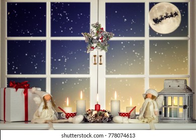 Merry Christmas and Happy Holidays! A beautiful decorated for Christmas window. Winter forest from the window of the house. - Powered by Shutterstock