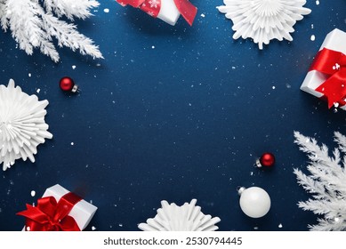 Merry Christmas and Happy Holidays greeting card, frame, banner. New Year. Noel. White Christmas gifts, presents, red ornaments on blue background top view. Winter holiday xmas theme. Flat lay. - Powered by Shutterstock