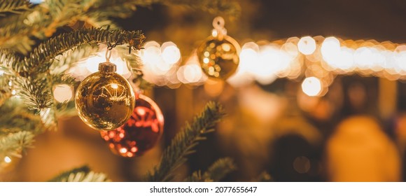 Merry Christmas Holiday With Star And Hearts Gold On The Tree, Toy Socks, Merry Christmas On The Bokeh Background Happy New Year And Family Happiness Festival  Background Beautiful Decorations.