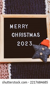 Merry Christmas Lettering On Letter Board. Minimalistic New Year Background 2023