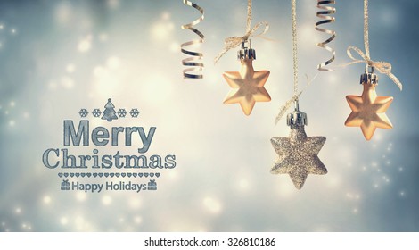 Merry Christmas message with hanging star ornaments - Shutterstock ID 326810186
