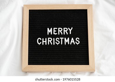 Merry Christmas On A Wooden Frame