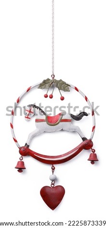 Merry Christmas rocking horse with bells and heart, Christmas vintage decoration isolated on white background, festive decorative object for tree or door, greeting gift card template or winter banner