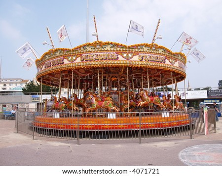 Merry go round, Antique style amusement ride.