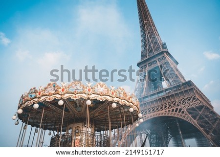 Merry go round in front of the Eiffel Tower, Paris France