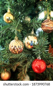 Merry Xmas And Happy New Year Celebration Decorations Concept. Close Up Of Christmas Tree Ornament.