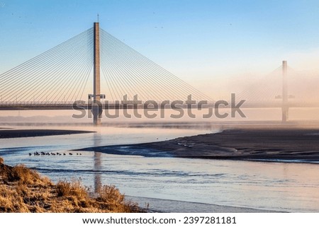 Mersey Gateway Bridge photographyed on a frosty winter morning. A toll bridge between Runcorn and Widnes in Cheshire, England, which spans the River Mersey and the Manchester Ship Canal.