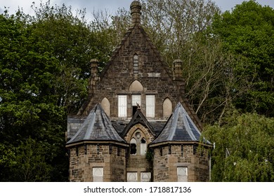 MERTHYR TYDFIL, WALES - 29 APRIL 2020 - A Run Down And Empty Merthyr Synagogue Building In Amongst The Trees On A Spring Day.