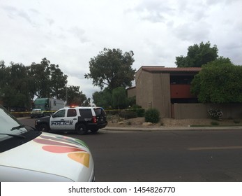 Mesa, Ariz. / US - March 18, 2015: Mesa Police Officers At A Crime Scene During  A Shooting Spree To Which Alleged White Supremacist Ryan Elliot Jiroux Later Pled Guilty. 2765