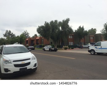 Mesa, Ariz. / US - March 18, 2015: Mesa Police Officers At A Crime Scene During  A Shooting Spree To Which Alleged White Supremacist Ryan Elliot Jiroux Later Pled Guilty. 2770