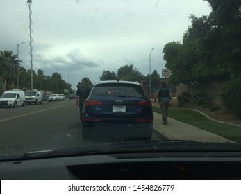 Mesa, Ariz. / US - March 18, 2015: Mesa Police Officers At A Crime Scene During  A Shooting Spree To Which Alleged White Supremacist Ryan Elliot Jiroux Later Pled Guilty. 2762