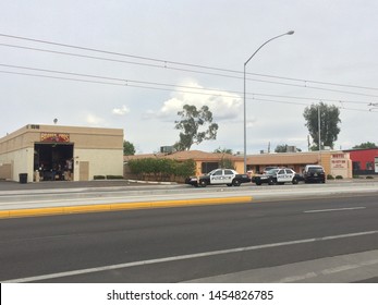 Mesa, Ariz. / US - March 18, 2015: Mesa Police Officers At A Crime Scene During  A Shooting Spree To Which Alleged White Supremacist Ryan Elliot Jiroux Later Pled Guilty. 2750