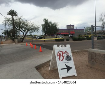 Mesa, Ariz. / US - March 18, 2015: Mesa Police Officers At A Crime Scene During  A Shooting Spree To Which Alleged White Supremacist Ryan Elliot Jiroux Later Pled Guilty. 2759