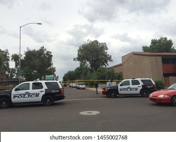 Mesa, Ariz. / US - March 18, 2015: Mesa Police Officers At A Crime Scene During  A Shooting Spree To Which Alleged White Supremacist Ryan Elliot Jiroux Later Pled Guilty. 2766