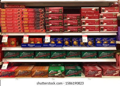 Mesa, AZ - Nov 27, 2019: Grocery Store Shelf With Seasonal Candy Products, Cella's Chocolate Covered Cherries And Andes Brand Mints. Popular Christmas Holiday Candies.