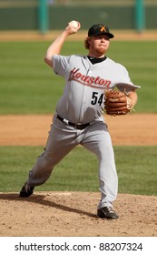 MESA, AZ - NOVEMBER 4: Salt River Rafters pitcher Jason Stoffel pitches off the mound in a game against the Mesa Solar Sox at Hohokam Park on November 4, 2011 in Mesa, AZ.