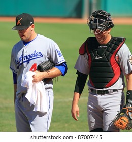 MESA, AZ - OCTOBER 17: Stephen Fife (in LA Dodgers Uniform) Prepares To Pitch For The Salt River Rafters In The Arizona Fall League Oct. 17, 2011 At HoHoKam Stadium In Mesa, AZ. Jason Castro Is His Battery Mate.