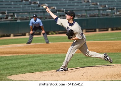 MESA, AZ - OCTOBER 19: San Diego Padres Prospect Erik Davis Delivers A Pitch For The Peoria Saguaros In An Arizona Fall League Game Oct. 19, 2010 At Phoenix Municipal Stadium. The Saguaros Lost 7-3.