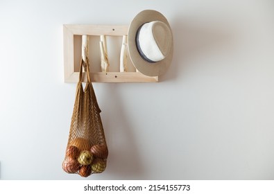 Mesh Bag And On Handmade Wooden Hang. Concept Of Slowlife Home