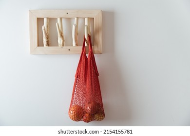 Mesh Bag And On Handmade Wooden Hang. Concept Of Slowlife Home