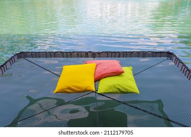 Mesh balcony for relaxing with pillow and enjoying into the pool  - Shutterstock ID 2112179705