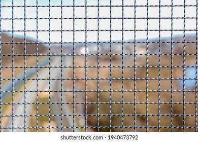 Mesh for industrial railroad fencing. Wire fence, protective grill