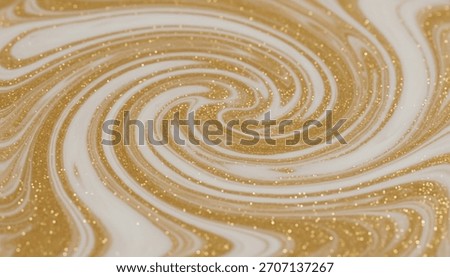 A mesmerizing abstract background featuring a dynamic swirl of liquid gold and creamy white paint. Golden glitter particles add a sparkling, luxurious texture to the fluid art.