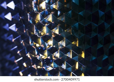Mesmerizing abstract background with geometric pattern of blue and gold hexagons. glowing crystal texture and sharp futuristic design create sophisticated, mysterious feeling