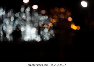 A mesmerizing abstract display of blurred lights in various colors, creating a whimsical night scene.