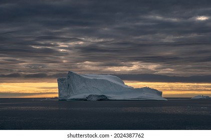 Mesmerizing Iceberg In Antarctica At Sunset