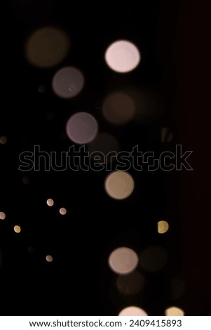 Mesmerizing light bokeh captures the enchanting dance of radiant orbs, creating a dreamlike ambiance. A celestial spectacle of blurred brilliance.