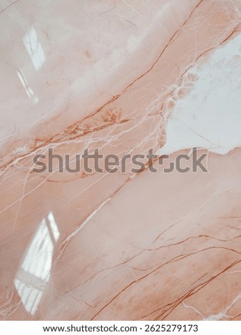 Mesmerizing pink marble patterns showcase delicate swirls and soft veining in rosy hues, blending elegance and charm. The luxurious texture adds a graceful, feminine touch to any sophisticated design.